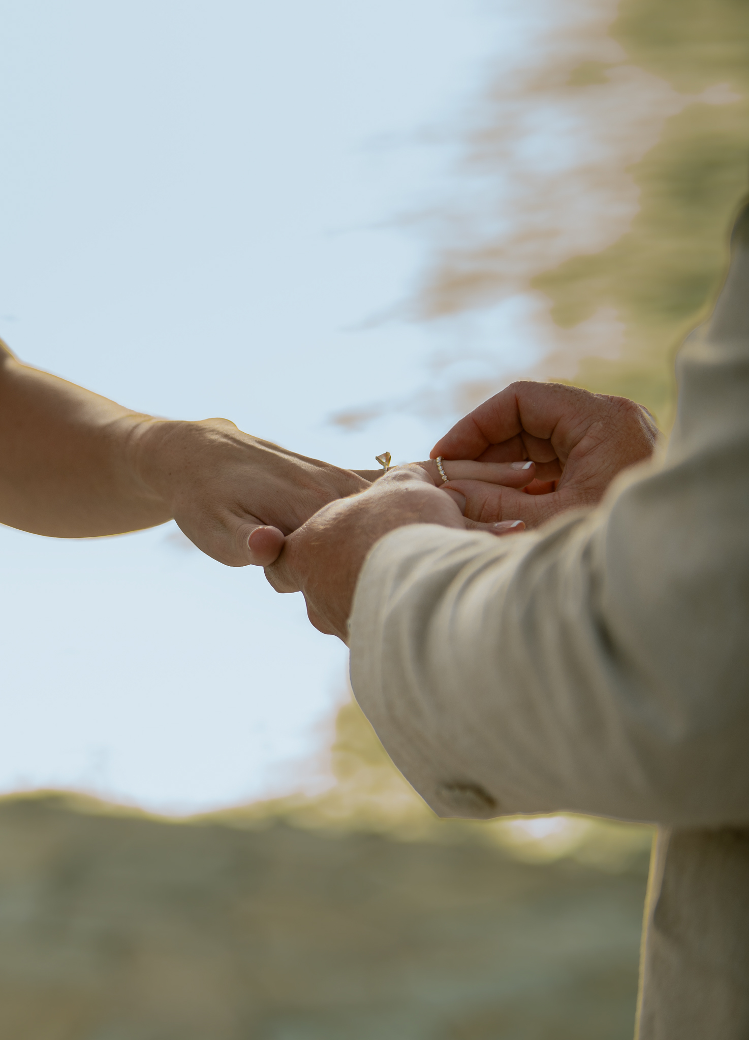 The ring going on, close up